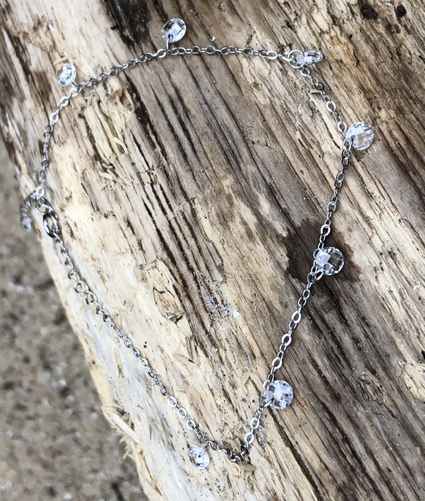 Sølvarmbånd med hvide zirkonia sten på drivtømmer